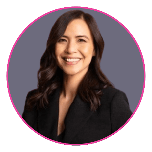 Dr Samantha Hiew smiling against a grey background, wearing a black outfit. UK-based neurodiversity advocate, speaker, and founder of ADHD Girls.