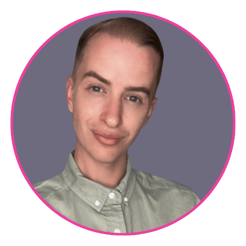 David wearing a light green button-up shirt, smiling. 