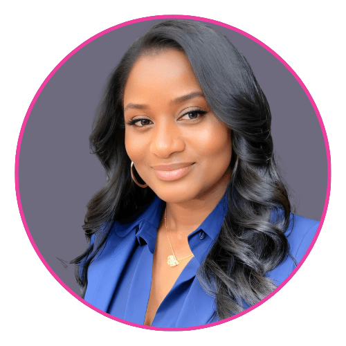 Montreece looking forward with a slight smile, wearing a royal blue blouse and gold pendant.